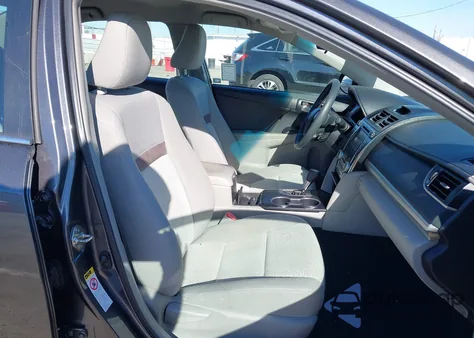 2014 Toyota Camry Le z USA, uszkodzony, nr VIN 4T4BF1FKXER377376